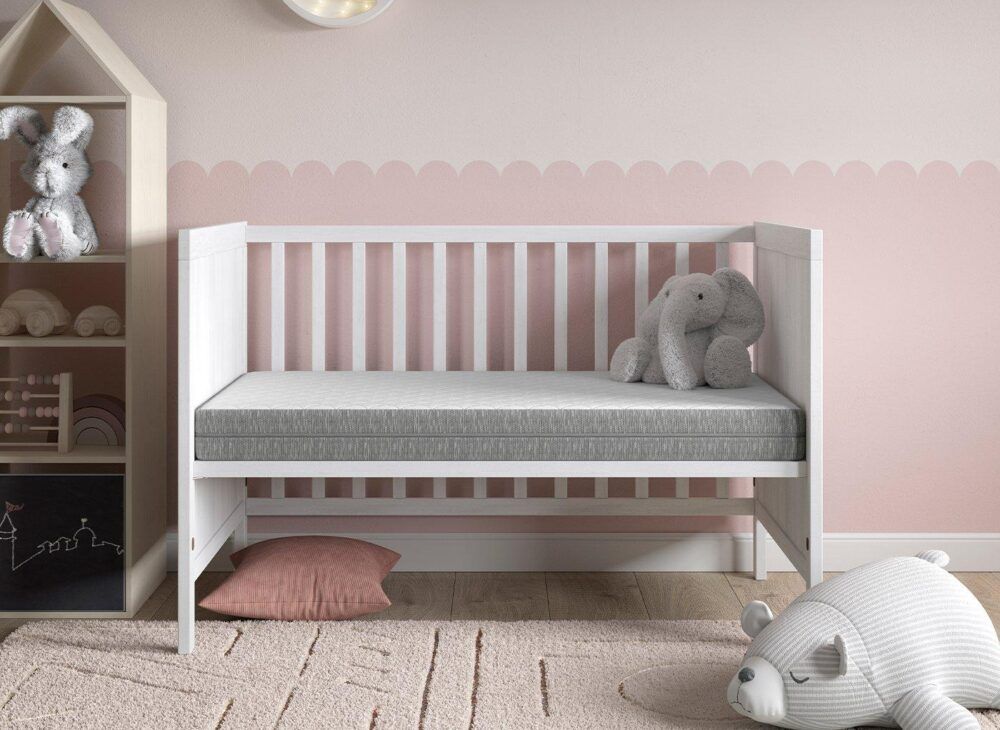 Twinkle Twinkle 60 x 120cm Cot Mattress in a pink bedroom